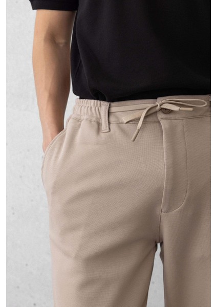 Akira Örme Pike Kumaş Beli Lastikli Fermuarlı Erkek Pantolon - Bej fiyatları