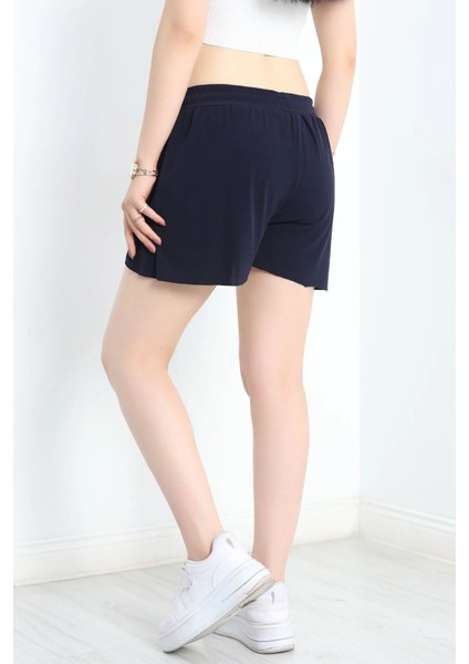 Kadın Beli Bağcıklı Yanlardan Yırtmaç Detaylı Çift Katmanlı Dökümlü Hafif Sandy Kumaş Tayt Şort modelleri