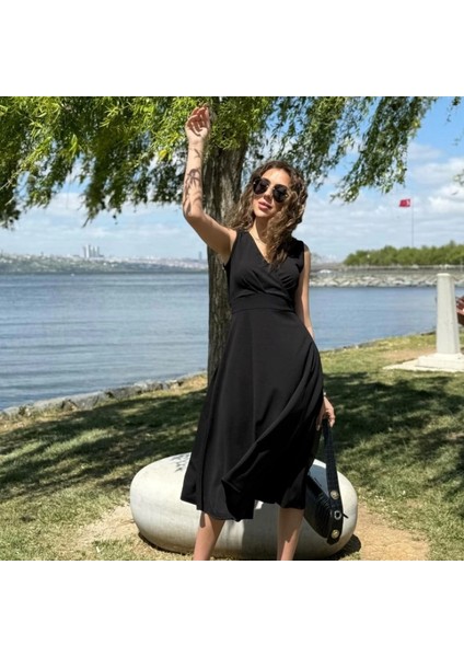 Kadın Ithal Krep Kumaş Kruvaze Yaka Eteği Kloş Kolsuz Mini Elbise modelleri