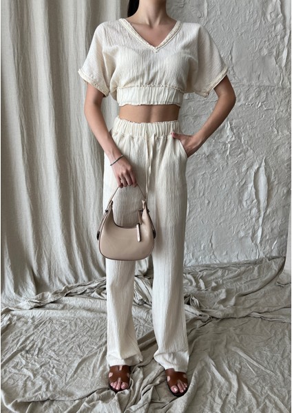 Kadın Keten Kısa Kollu V Yaka Bluz ve Pantolon Bol Kesim fırsatları