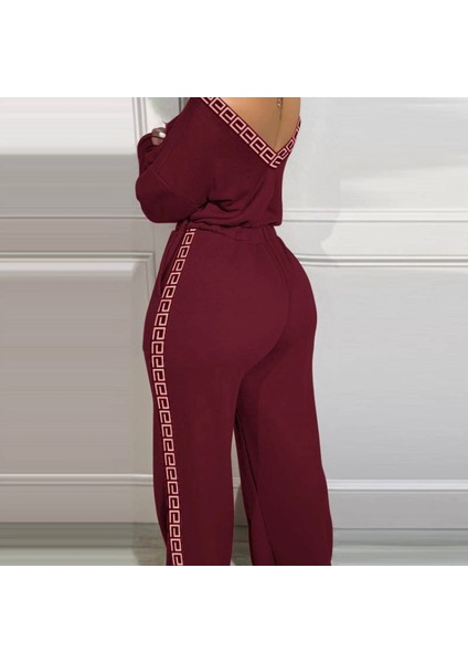 Kadın Uzun Kollu Omuzlardan Açık Beli Lastikli Cepli Şerit Desenli Viskon Iki Iplik Tulum modelleri