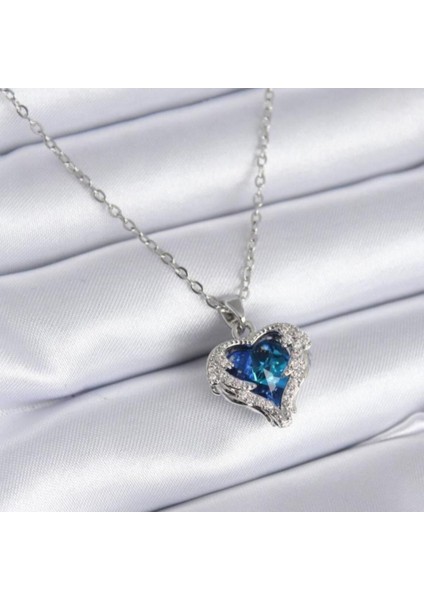 Gümüş Renk Sf Zincirde Mavi Kalp Gezegen Vip Solmaz Kararmaz Çelik Kolye