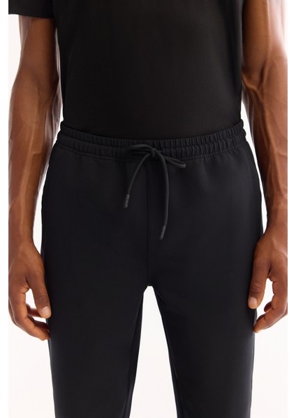 Erkek Siyah Beli Lastikli Bağcıklı Bi-Stretch Regular Fit Eşofman Altı A52Y3414 fırsatları