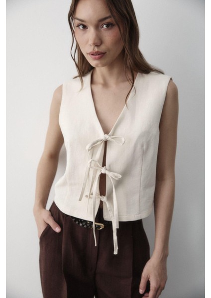 Kadın Bağlamalı Keten Yelek indirimleri