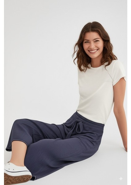 Kadın Pantolon Pamuklu Burgu Kumaş Beli Lastikli Saç Örgü Modelli Likralı Geniş Paça fırsatları