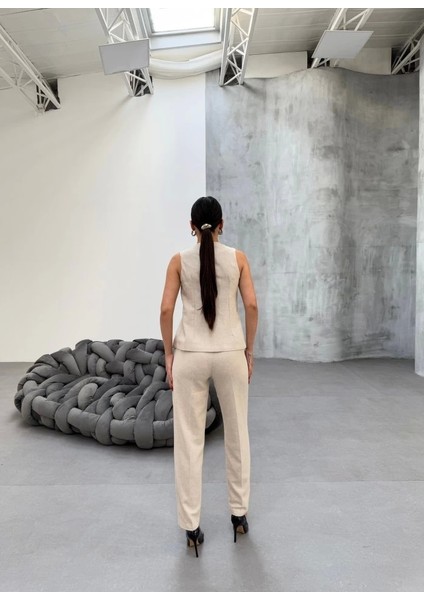 Ti̇na Asi̇metri̇k Keten Yelek Pantolon Takim fiyatları