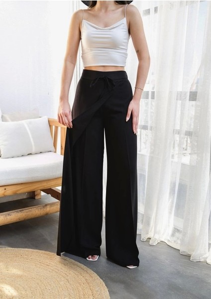 Keten Önü Çapraz Parçali Lasti̇kli̇ ve Bağcikli Geni̇ş Paça Pantolon modelleri