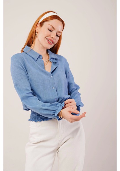 Bel ve Bilek Lastikli Mavi Bluz fırsatları