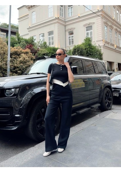 Kadın Bisiklet Yaka Asimetrik Kesim Atlet Detay Bluz ve Yüksek Bel Bol Paça Pantolon Ikili Takım fiyatları