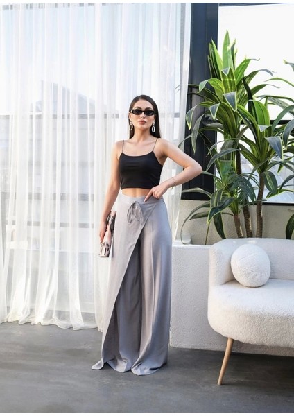 Keten Önü Çapraz Parçali Lasti̇kli̇ ve Bağcikli Geni̇ş Paça Pantolon