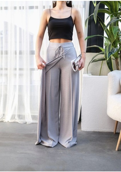 Keten Önü Çapraz Parçali Lasti̇kli̇ ve Bağcikli Geni̇ş Paça Pantolon modelleri