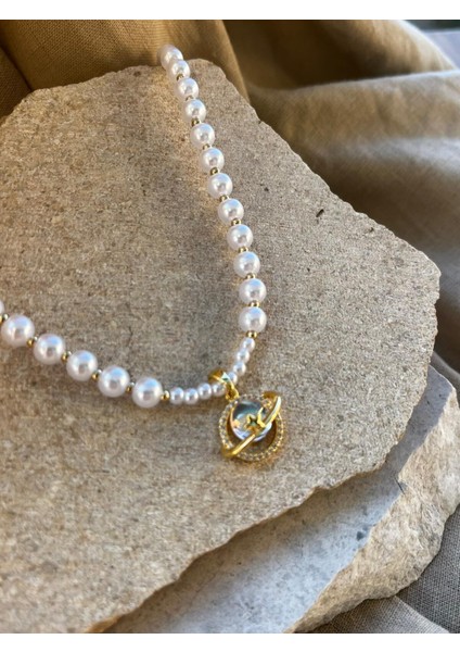 Inci Taş Dizilimli Gezegen Uçlu Kolye fiyatları