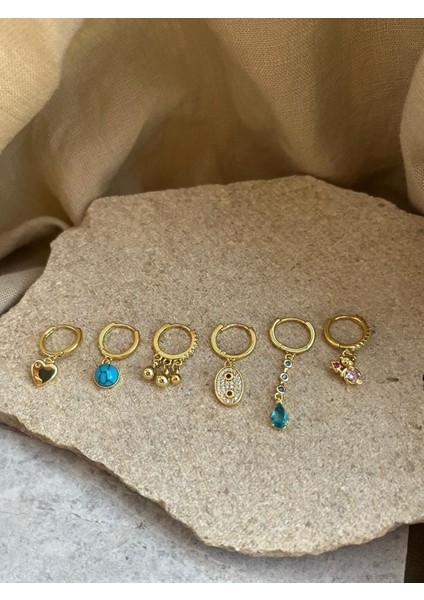 Altın Renkli Taş Detaylı Altılı Küpe