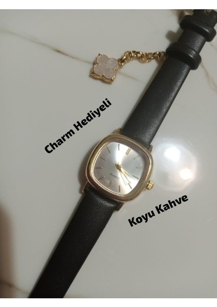 Vintage Retro Still Marka Model Oval Charmlı- Gold Kasa - Koyu Kahve Kordon Kadın Kol Saati 0021
