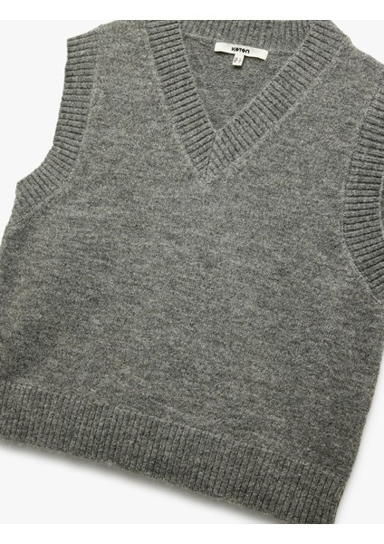 V Yaka Kolsuz Triko Süveter indirimleri