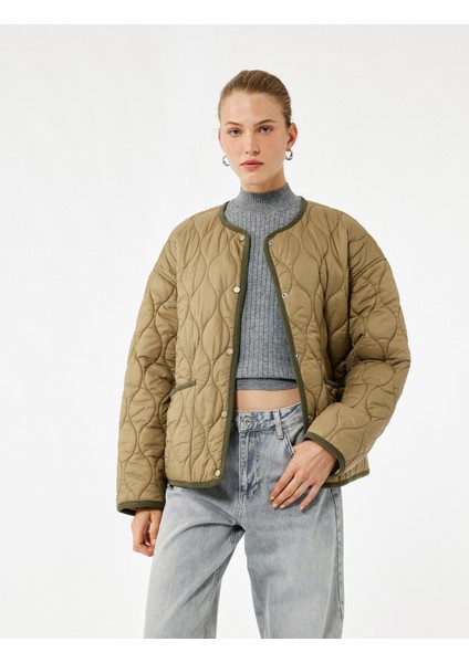 Uzun Kollu Düğmeli Cepli Bisiklet Yaka Su Itici Kapitone Mevsimlik Mont