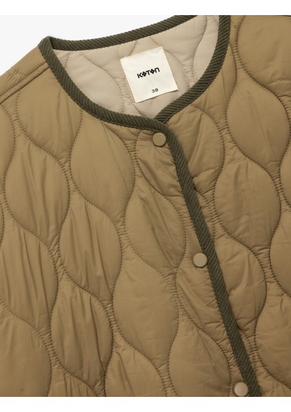 Uzun Kollu Düğmeli Cepli Bisiklet Yaka Su Itici Kapitone Mevsimlik Mont indirimleri