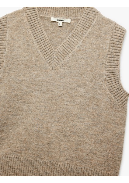 V Yaka Kolsuz Triko Süveter indirimleri