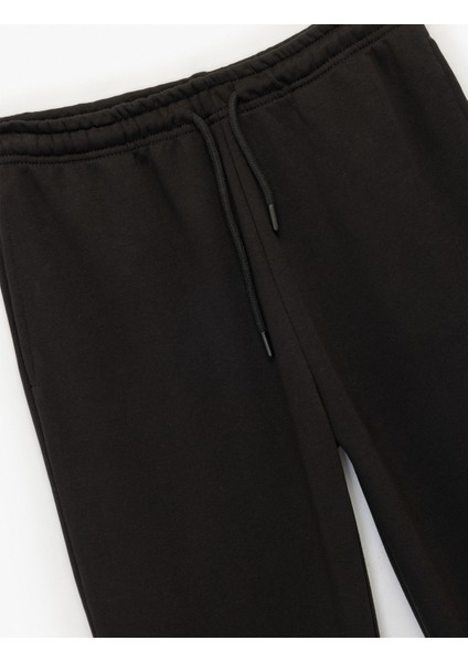 Normal Bel Üç Iplik Nervürlü Cepli Eşofman Altı modelleri