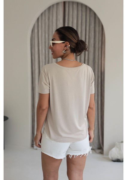 Kadın Yuvarlak Yaka Kol Etek Lazer Kesim Yırtmaç Detaylı Modal T-Shirt fiyatları