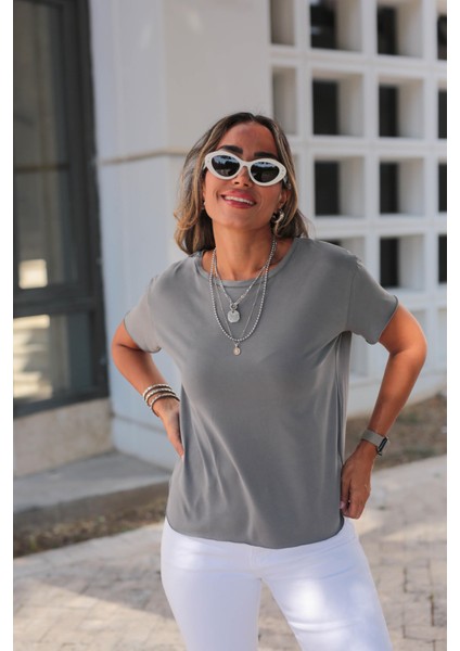 Kadın Yuvarlak Yaka Kol Etek Lazer Kesim Yırtmaç Detaylı Modal T-Shirt fırsatları