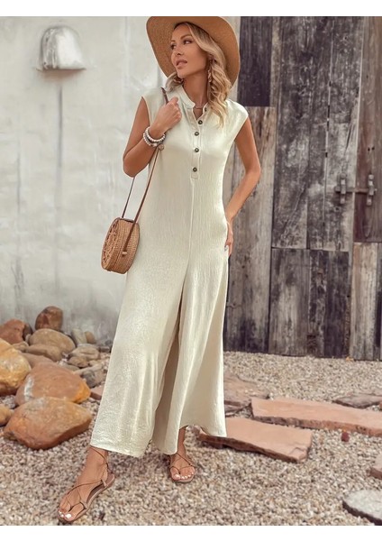 Kadın Kısa Kollu önden Düğmeli Paçaya Doğru Geniş Cepli Uzun Bürümcük Tulum indirimleri