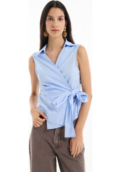 Kruvaze Yaka Bağlamalı Kolsuz Bluz Mavi fırsatları
