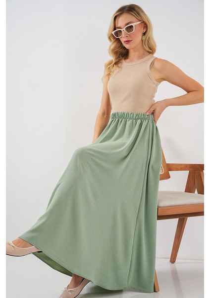Kadın BDART Çekmece Bel Detaylı Dokulu Maxi Etek Zümrüt Yeşili modelleri