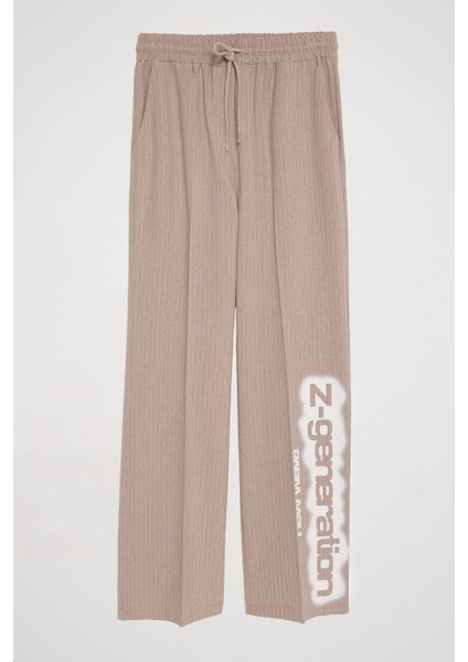 Paçası Yazılı Beli Lastikli Çizgili Pantolon Bej fiyatları