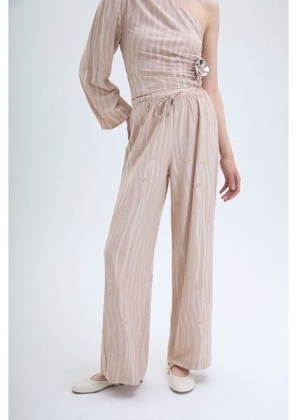 Beli Lastikli Bol Paça Dokulu Pantolon Bej fırsatları