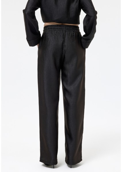 Beli Lastikli Dokulu Bol Pantolon Siyah indirimleri