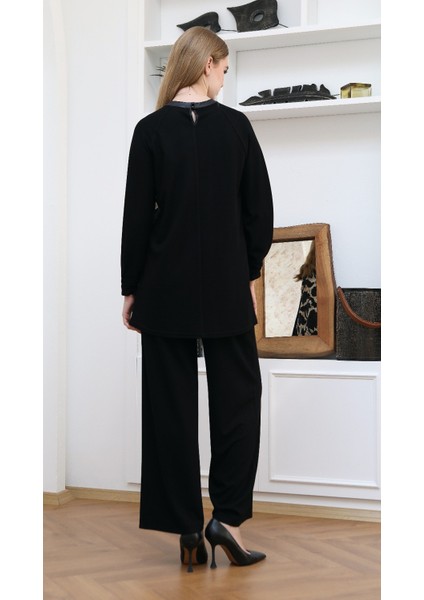 43403 Önü Tül ve Pul Işlemeli Yaprak Desenli Kolu Kat Detaylı Triko Tunik indirimleri