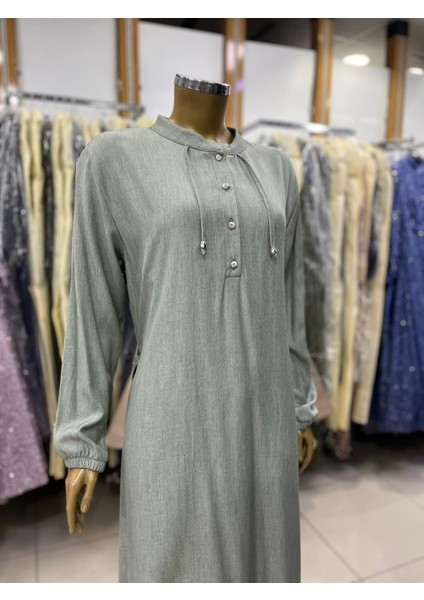 1042 Hakim Yaka Önü Göğüse Kadar Düğmeli Kol Ucu Lastikli Yakası Ip Detaylı Günlük Düz Renk Elbise #05-25# modelleri