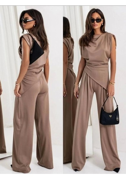 Kadın Dalgıç Kumaş Sıfır Kol Bluz ve Bol Kesim Pantolon Ikili Takım fırsatları