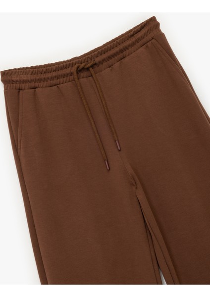 Cepli Rahat Kalıp Beli Bağcıklı Modal Karışımlı Geniş Paça Eşofman Altı modelleri