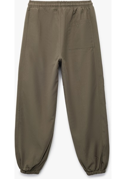 Cepli Beli Lastikli Bağlamalı Loose Fit Jogger Paraşüt Pantolon fiyatları