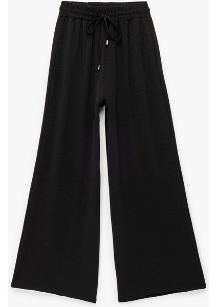 Aerobin Kumaş Beli Bağcıklı Cepli Geniş Paça Palazzo Pantolon