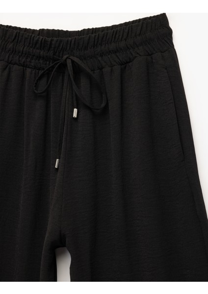 Aerobin Kumaş Beli Bağcıklı Cepli Geniş Paça Palazzo Pantolon modelleri