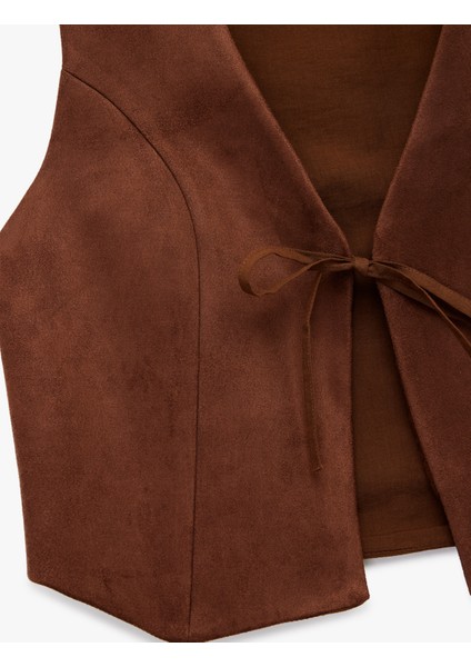 Slim Fit V Yaka Bağlama Detaylı Crop Suni Süet Yelek indirimleri