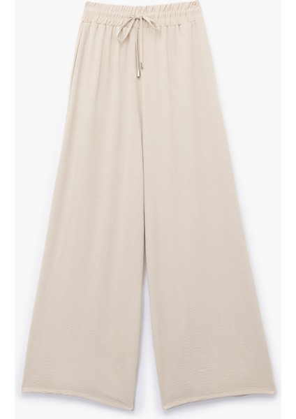Aerobin Kumaş Beli Bağcıklı Cepli Geniş Paça Palazzo Pantolon