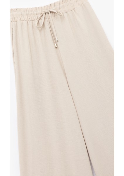 Aerobin Kumaş Beli Bağcıklı Cepli Geniş Paça Palazzo Pantolon modelleri