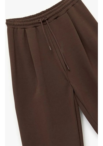 Pamuklu Rahat Kalıp Pileli Beli Bağcıklı Geniş Paça Eşofman Altı 6WAL40058IK fırsatları