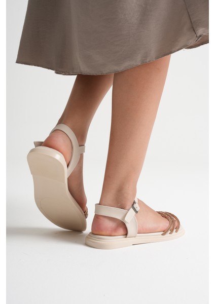 Kadın Spiral Şerit Taşlı Bilekten Bantlı Düz Taban Bej Sandalet fiyatları