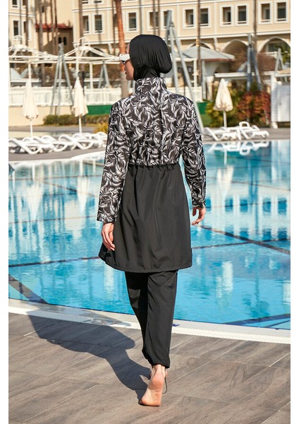 Remsa Tesettür Mayo Kadınlar İçin Beyaz Yaprak Desenli Paraşüt Kumaş Üst ve Pantolon Seti fırsatları