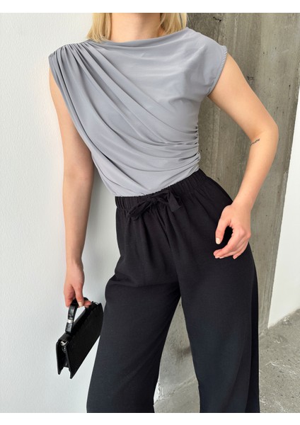 Kadın Büzgülü Sandy Kumaş Kolsuz Bluz fırsatları
