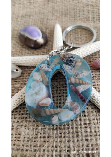 "o" Harfi - Açık Mavi Deniz Epoksi Harf Anahtarlık – Gerçek Deniz Kabuğu, El Yapımı, Benzersiz fiyatları