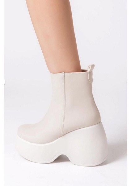 Kadın Celsi Krem Cilt Yandan Fermuarlı 9 cm Yüksek Dolgu Topuklu Mevsimlik Kadın Kısa Bot Bootie fırsatları