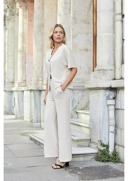 Kadın 1.sınıf Modal Esnek Kumaş Yüksek Bel Önden Dikişli Yan Cepli Bol Paça Palazzo Pantolon-Şampanya modelleri