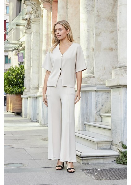 Kadın 1.sınıf Modal Esnek Kumaş Yüksek Bel Önden Dikişli Yan Cepli Bol Paça Palazzo Pantolon-Şampanya indirimleri