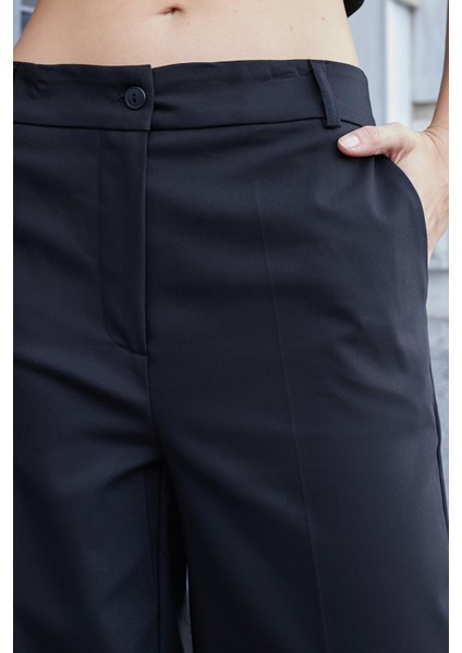 Kadın Yüksek Bel Yan Cepli Bol Paça Rahat Kesim Palazzo Kumaş Pantolon-Siyah